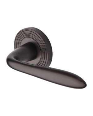 Heritage Brass Door Handle Lever Latch on Round Rose Sutton Reeded Design Matt Bronze finishUK Registered Design Number 6204750