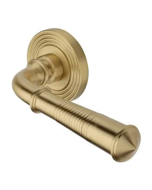 Heritage Brass Door Handle Lever Latch on Round Rose Bridgetown Reeded Design Satin Brass finishUK Registered Design Number 6226297
